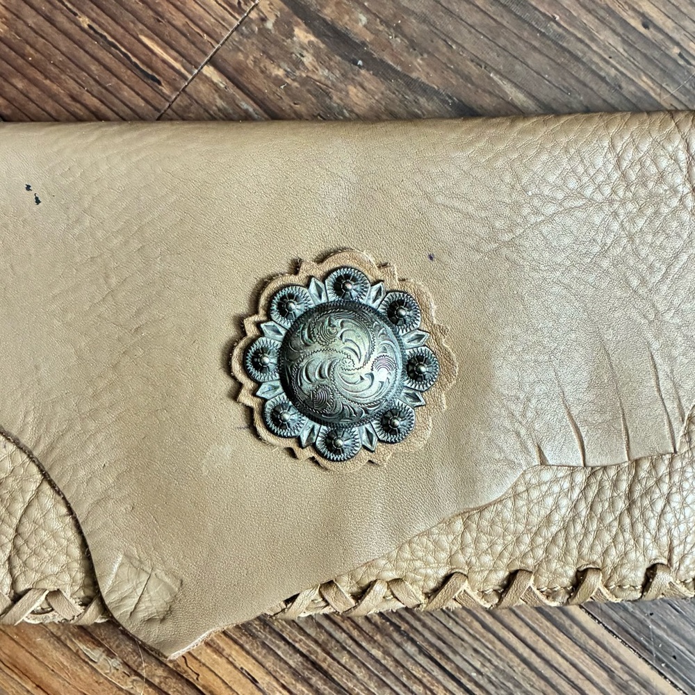 Tan Leather Clutch with Silver Accent. 100% Cowhide, very soft.